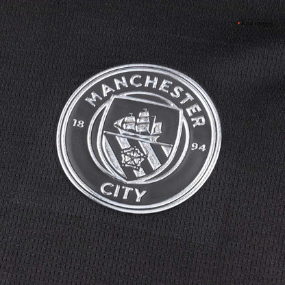 Nogometni dres Manchester Cityja za goste (dres + kratke hlače) 2025/26 črne barve